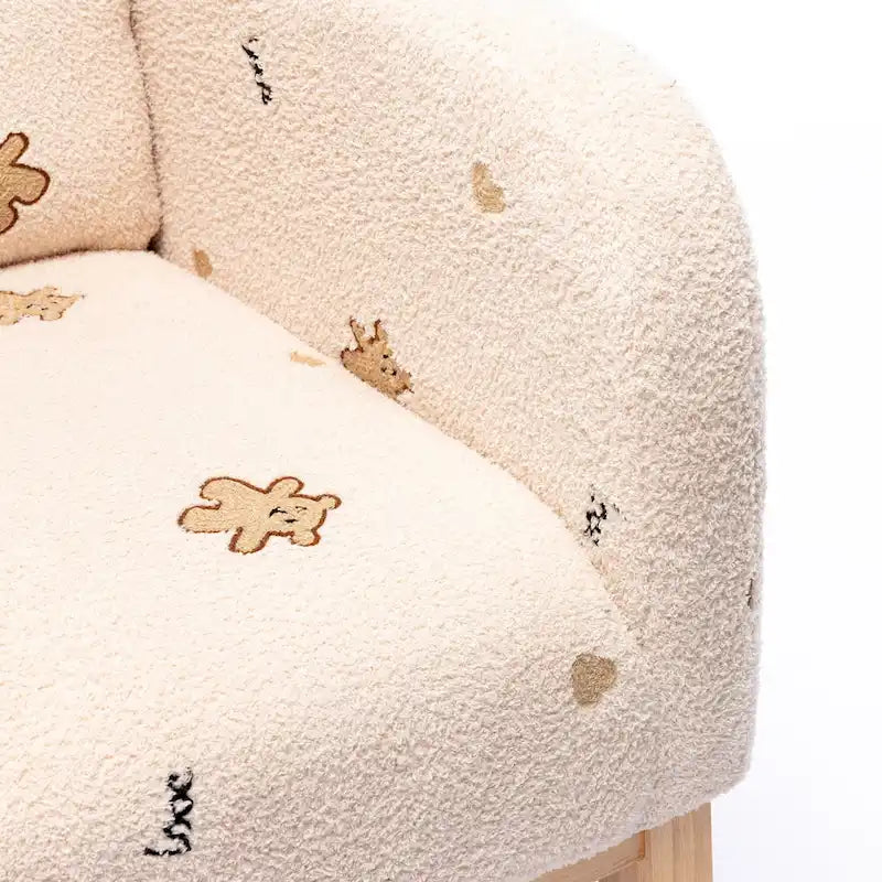 Fauteuil à bascule haut de dossier en tissu bouclé avec poches latérales