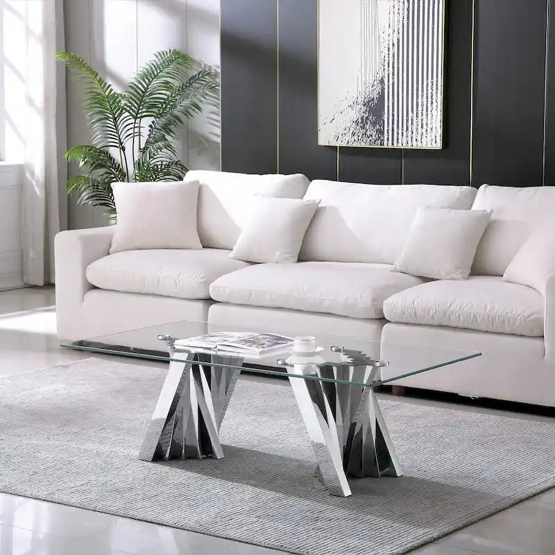 Table basse avec plateau en verre trempé et base en acier inoxydable finition miroir