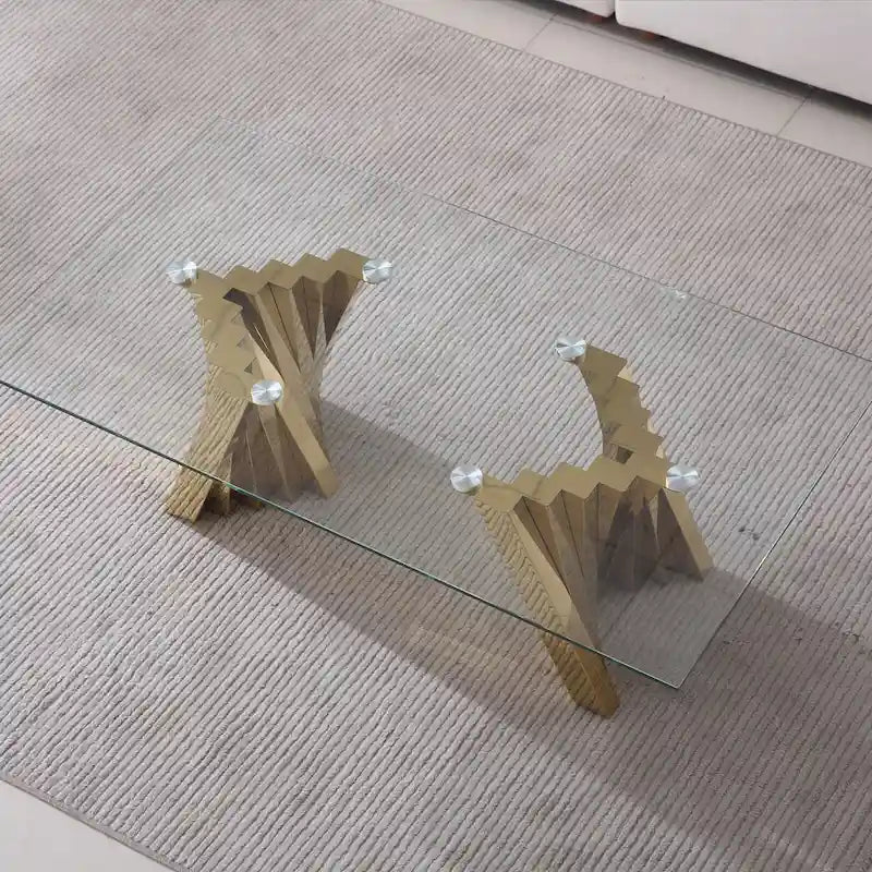 Table basse avec plateau en verre trempé et base en acier inoxydable finition miroir