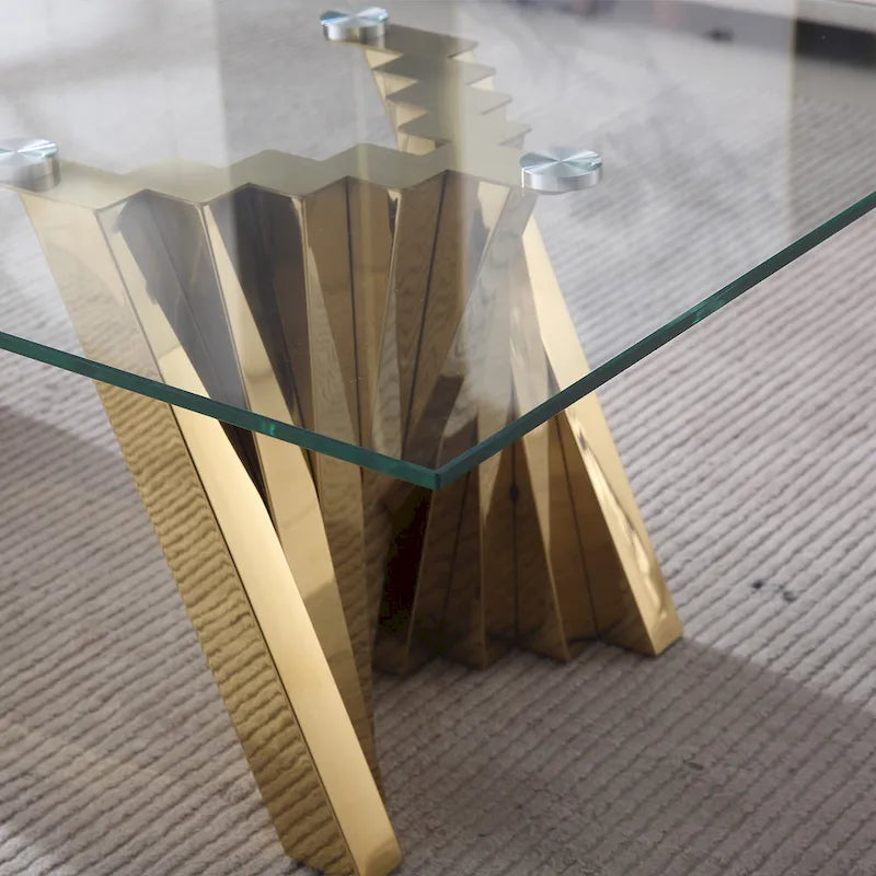 Table basse avec plateau en verre trempé et base en acier inoxydable finition miroir