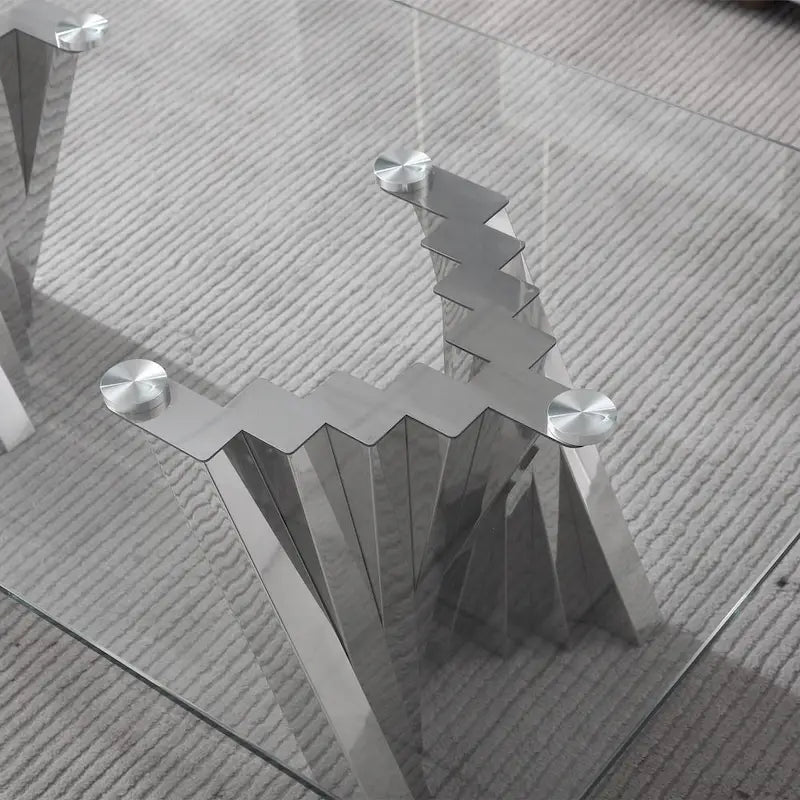 Table basse avec plateau en verre trempé et base en acier inoxydable finition miroir