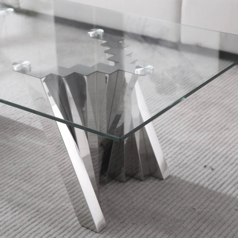 Table basse avec plateau en verre trempé et base en acier inoxydable finition miroir