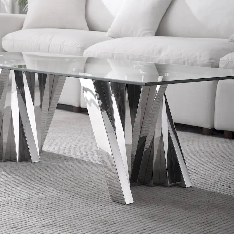 Table basse avec plateau en verre trempé et base en acier inoxydable finition miroir