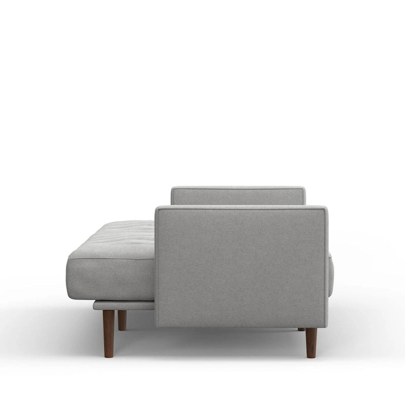 Canapé-lit convertible capitonné à coutures verticales