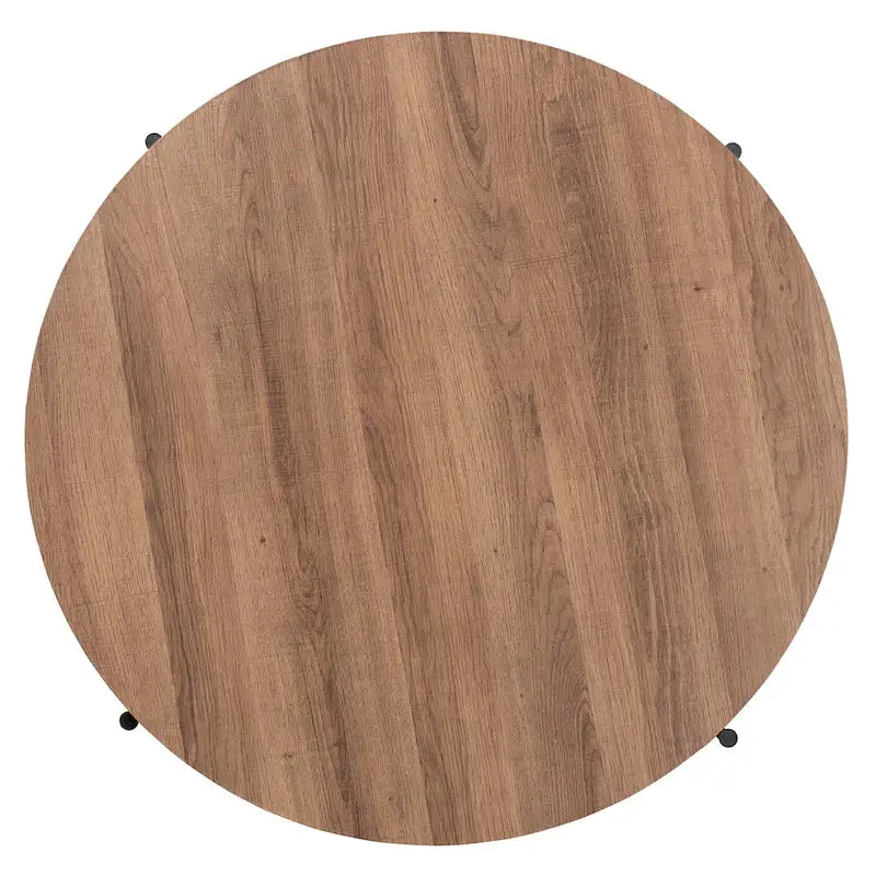 Table basse industrielle ronde avec plateau en bois de noyer et piétement en métal noir entrecroisé